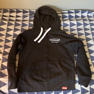 Nintendo New York 1889 Mario Coin Official Black Zip-Up Hoodie